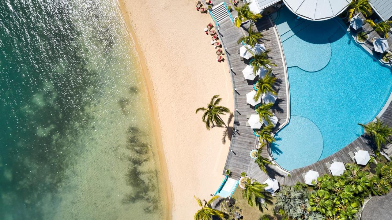 Lux* Grand Gaube Resort & Villas Exterior foto Aerial view of the pool and beach at the Sheraton Maldives Resort & Spa